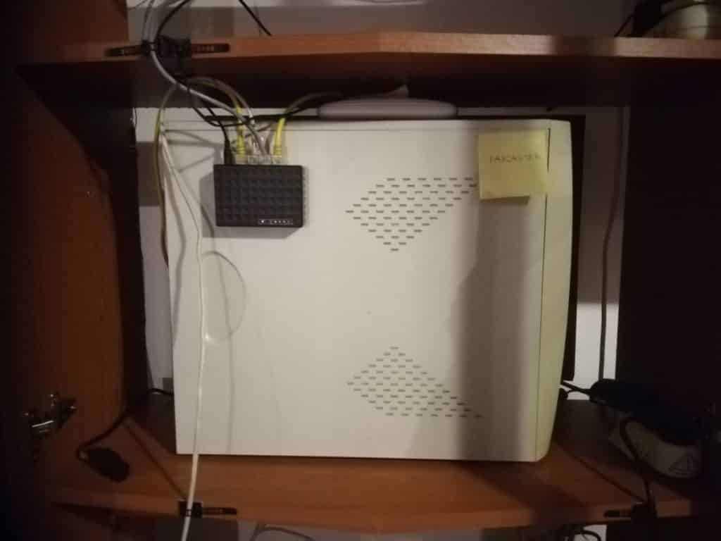 Here you can see Farcaster, the pfSense machine and a black gigabit ethernet switch